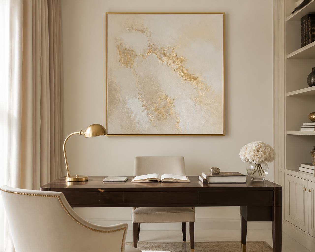 Ivory and gold painting above a desk